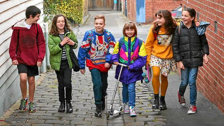 Devlin Walker (centre) and his friends walk to school in Clifton Hill. Photo: Scott Barbour / Getty Images