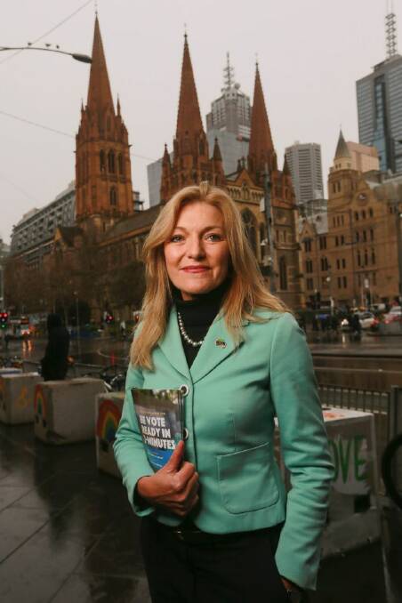 Fiona Patten
, Victorian state member of the upper house and leader of the sex party handing out how to vote cards for marriage equality at Flinders street station in Melbourne today. Picture by Wayne Taylor 21st August 2017. AFR.