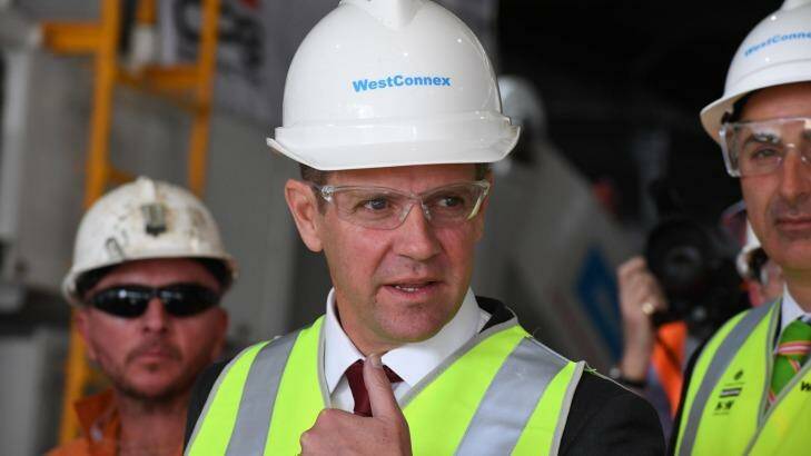 Premier Mike Baird says the government is determined to ensure homes are acquired ''fairly and compassionately'' for WestConnex. Photo: Peter Rae
