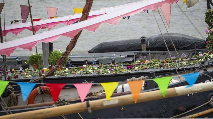 Flowers have been left on the houseboat where Jo Cox lived in Hermitage Moorings on the River Thames in Wapping, London. Photo: Jack Taylor/Getty Images