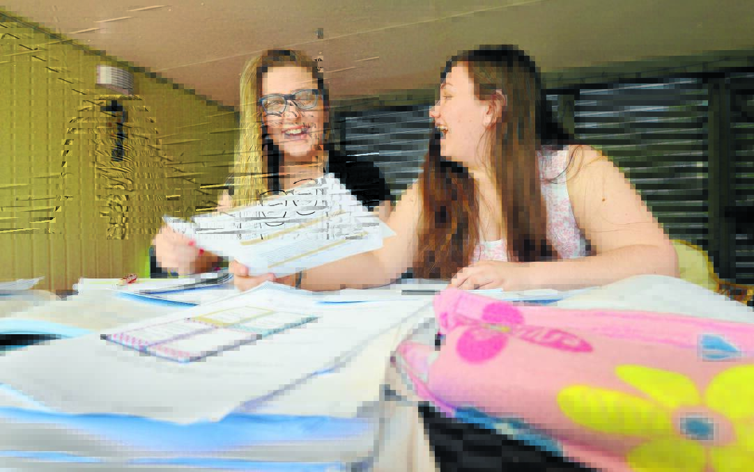 STUDY SESSION: Rebecca Whitten and Shanae Walton preparing for their HSC exams. Photo: Barry Smith 091015BSB01