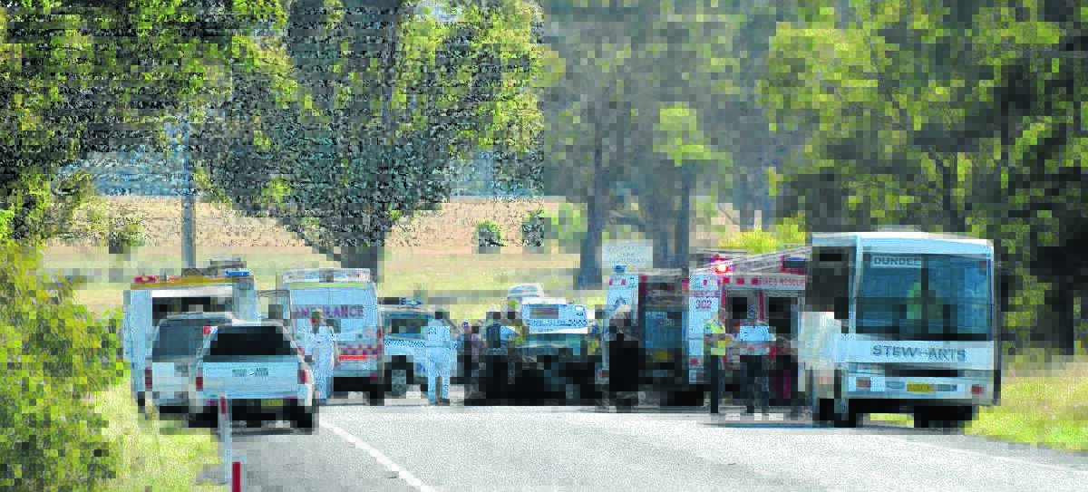 SERIOUS INJURIES: Specialist crash unit police have taken charge of the investigation into yesterday’s bus and car collision, which injured five people including three school students. Photo: Glen Innes Examiner
