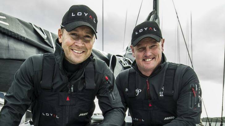Michael Clarke and Andrew Bell on board Perpetual Loyal in July 2014. Photo: Brett Hemmings