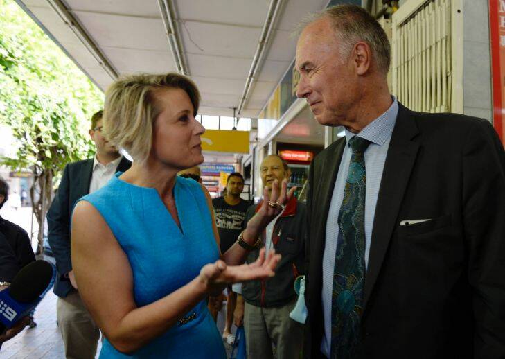 Kristina Keneally snuck up on John Alexander while he was campaigning in Eastwood Mall with Julie Bishop. Pic Nick Moir 15 nov 2017