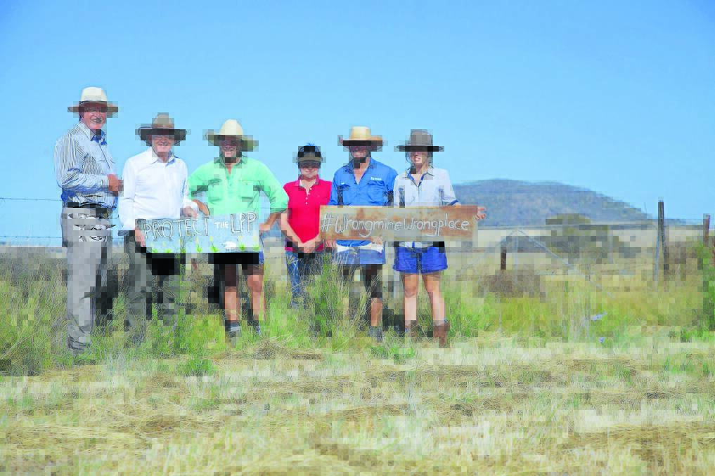 WRONG MINE WRONG PLACE: Independents Peter Draper and Rohan Boehm with Liverpool Plains Youth members Joe Norman, Gemma Norman, Hugh Pursehouse and Sarah Sulman at the site of the proposed Shenhua Watermark coal mine.