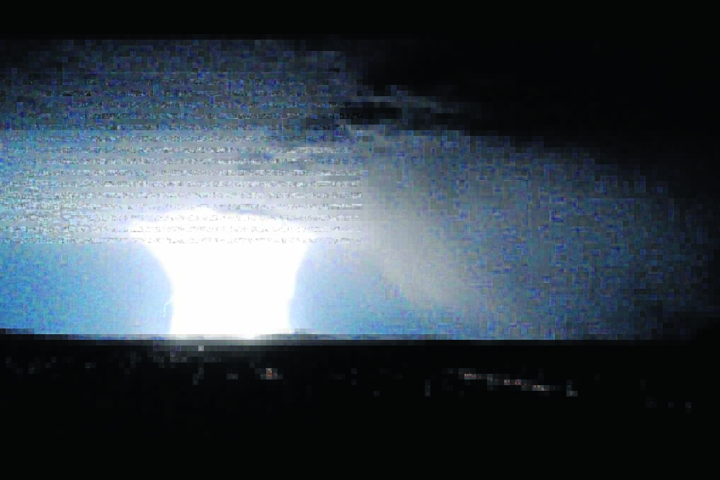 STORMY NIGHT: Manilla resident Lindsay Scott Cederblad took this photo from the Manilla Lookout on Monday night. That s Manilla in the foreground.