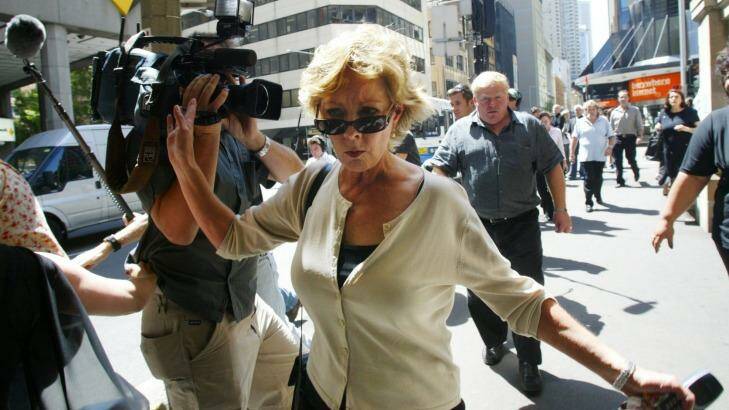 Anne Melocco leaving court after her husband was sentenced to two and a half years jail in 2005.  Photo: Wade Laube