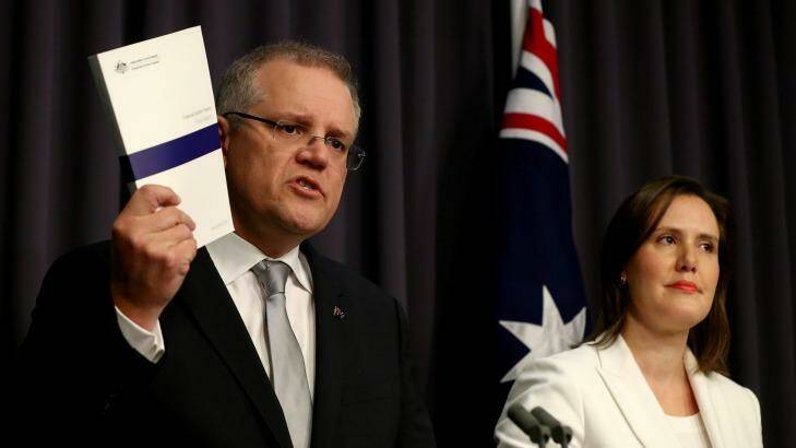 Mr Morrison and assistant treasurer Kelly O'Dwyer announce expanded powers to ASIC to regulate the financial sector on Wednesday. Photo: Alex Ellinghausen