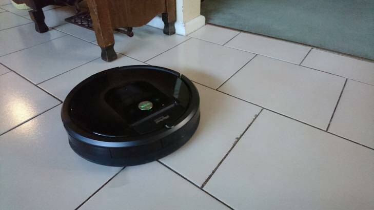 Roomba works on tiles or carpet, and can boost its suction on the latter. It does tend to blow a lot of debris around on tiles. Photo: Tim Biggs