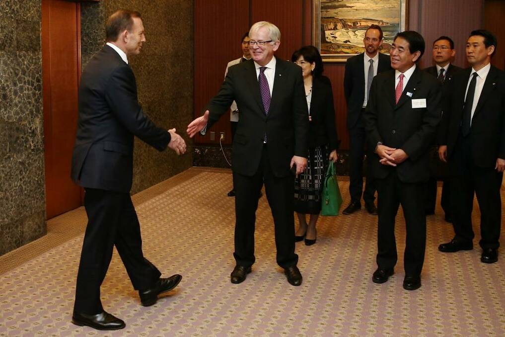 Prime Minister Tony Abbott greets Trade Minister Andrew Robb during the launch of the New Colombo Plan in Japan, in Tokyo on Monday 7 April 2014.
Photo: Alex Ellinghausen Photo: Alex Ellinghausen / Fairfax