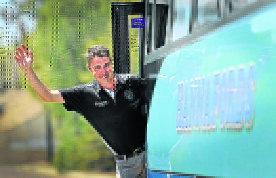 ONE OF THE BEST: Hannafords bus driver Carl Searle is celebrating his third place in a national driver competition. Photo: Geoff Newling 081014GOB02