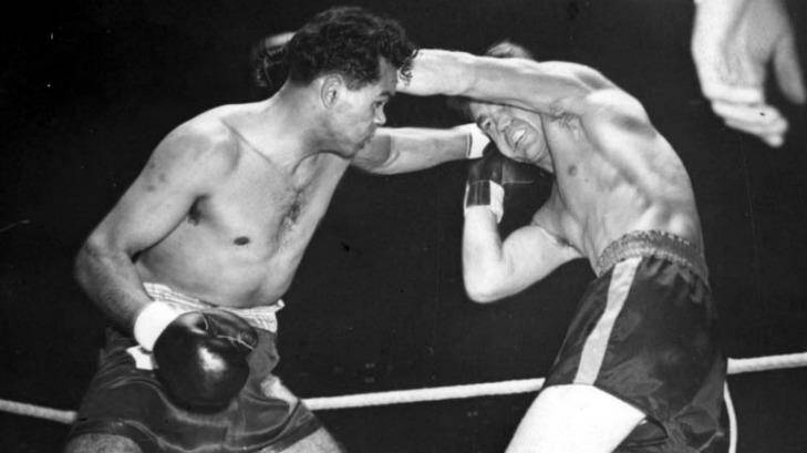 Newcastle boxer Dave Sands defeats American Pete Meads in London in 1949.