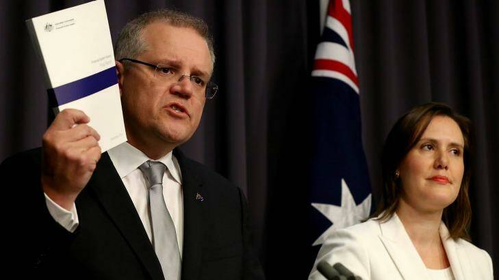 Treasurer Scott Morrison and assistant treasurer Kelly O'Dwyer announce expanded powers to ASIC to regulate the financial sector on Wednesday. Photo: Alex Ellinghausen