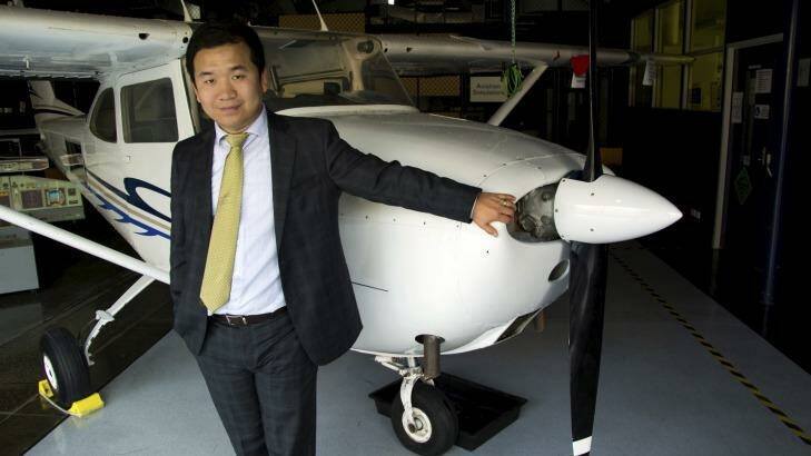 Yi Gao lectures the next generation of aviation professionals at Swinburne University of Technology. Photo: Fairfax
