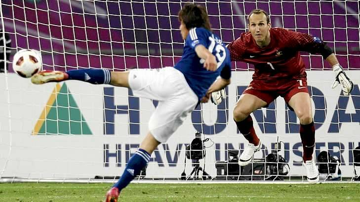 Heartbreaker: Japan's Tadanari Lee volleys home the winner against Australia's goalkeeper Mark Schwarzer during extra-time of their 2011 Asian Cup final. Photo: MOHAMMED DABBOUS