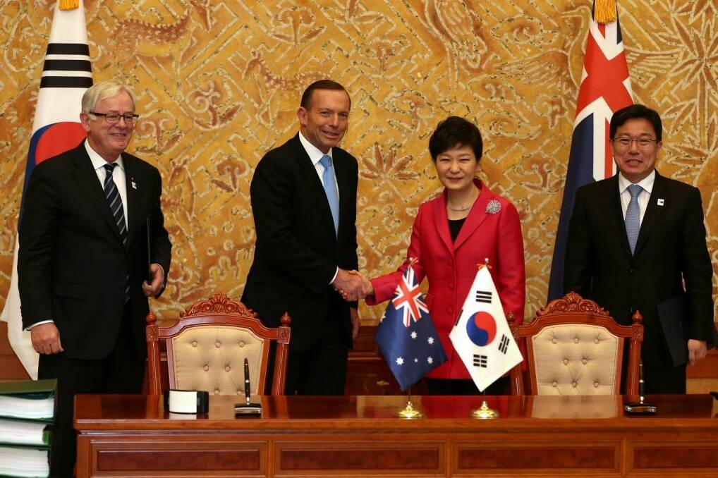Minister for Trade and Investment, Andrew Robb Prime Minister Tony Abbott, President of the Republic of Korea Park Geun-hye and Republic of Korea Trade Minister Yoon Sang-jick after the signing of the FTA in Seoul in April 2014. The regional trade pact has been criticised over a clause that allows multinationals to sue governments if new laws harm their profits. Photo: Alex Ellinghausen