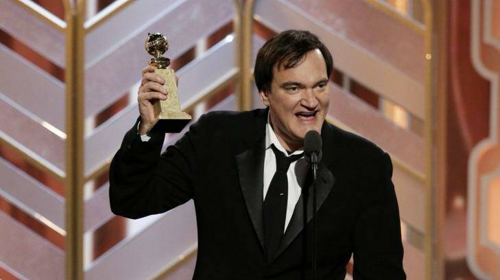 Director Quentin Tarantino accepts a Golden Globe Award for <i>The Hateful Eight</i> in January 2016. Photo: Paul Drinkwater