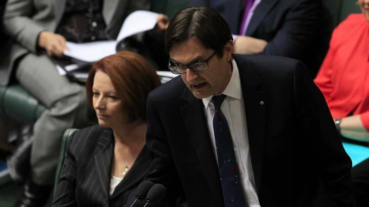 Former climate change minister Greg Combet and prime minister Julia Gillard. Photo: Andrew Meares