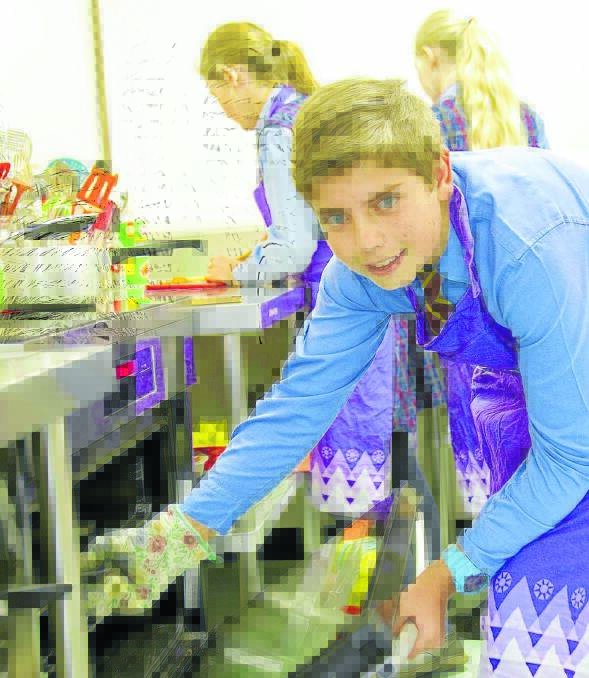 Nemingha Year 6 student Travis Chaffey hard at work in the kitchen.