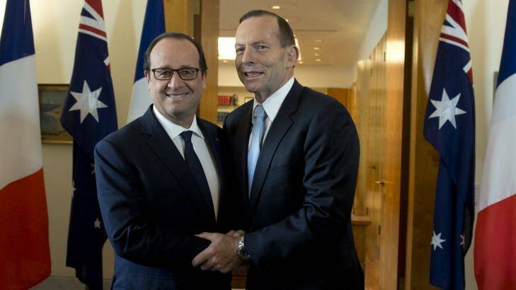 French connection: Tony Abbott (pictured with French President Francois Hollande) says it is essential that countries set a strong binding emissions reductions target at the 2015 climate conference in Paris. Photo: Supplied