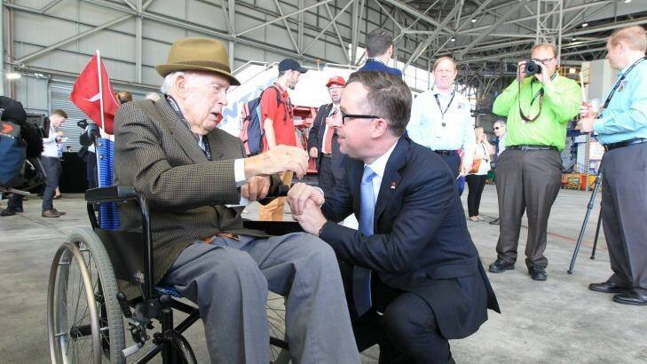 Qantas chief executive Alan Joyce, right, and former Qantas employee Michael Ryan, who worked for the airline from 1940 until the 1980s, met to celebrate the company's 95th anniversary. Photo: Peter Rae