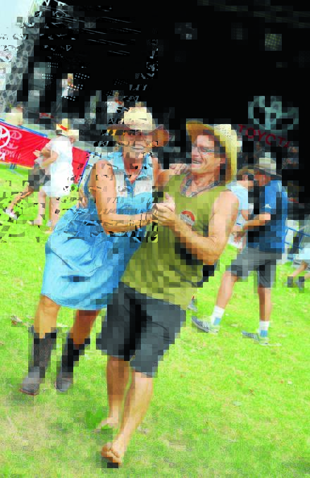 DANCE FEST: The Bicentennial Park stage was popular this year, with many, such as Kerry and Bill Gardeniers from Melbourne, kicking up their heels. 
Photo: Paul Mathews 210115PMB17