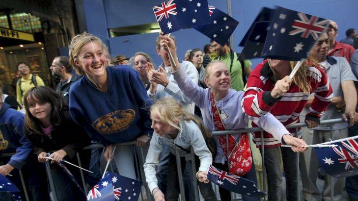 People watch the Anzac Day march as it marches down George Street, Sydney in 2009.  Photo: Tamara Dean