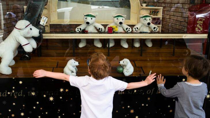 Children look at the Christmas displays in David Jones' windows in Sydney. Photo: Janie Barrett