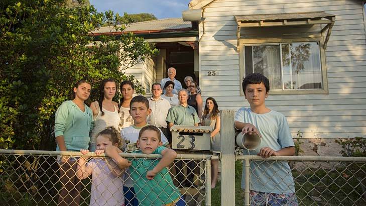 Letters of offer: Three generations of the Koutsoullis family and the Mortdale house many call home. Photo: Anna Kucera