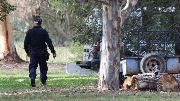Scene of killing: Police attend the Springvale property after the death of Roger Clements. Photo: Les Smith