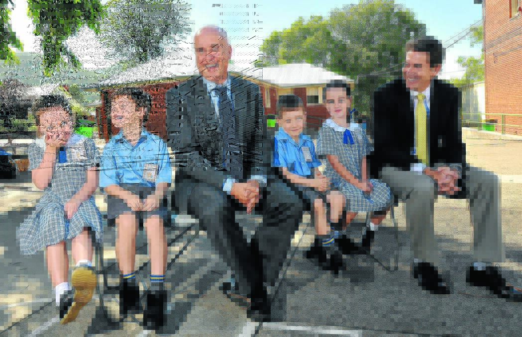 FIRST-DAY FUN: NSW Education Minister Adrian Piccoli, left, and Tamworth MP Kevin Anderson share a joke with Tamworth Public Kindergarten students, from left, Edith Walters, Gill Baines, Angus Wisse and Hannah Lovell. Photo: Gareth Gardner 290115GGA07