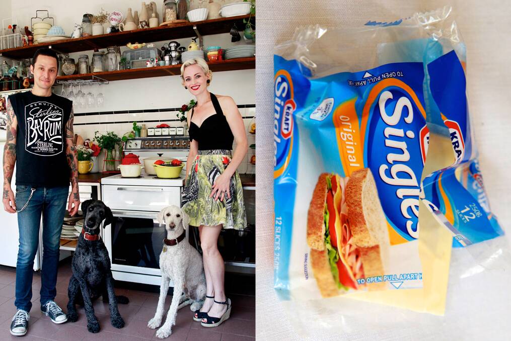 Elvis Abrahanowicz and Sarah Doyle of Porteno with their dogs Buddy (black) and Marcel (white). Elvis' secret vice is Kraft singles, while Sarah says peppermint choc chip ice-cream is her favourite food in the world. Photo: Edwina Pickles