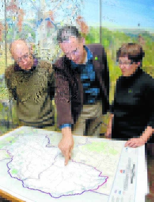WE ARE HERE: Greens candidate Mercurius Goldstein, centre, plans his next move in a new-look Northern Tablelands electorate, with Chris Nadolny and 
Elizabeth O’Hara. Photo: Tony Grant