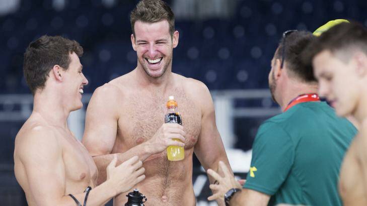 James Magnussen shares a laugh with teammates at the Tollcross International Swimming Centre. Photo: James Brickwood