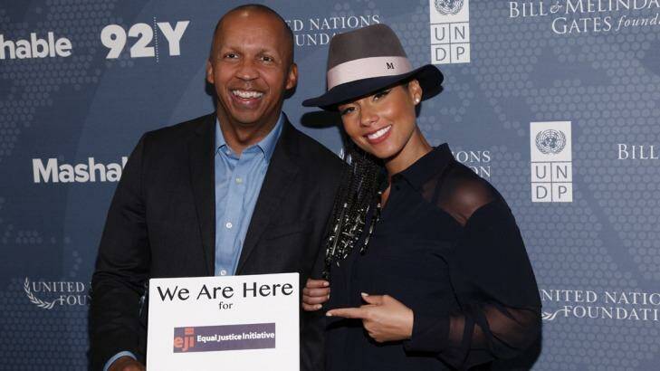 Bryan Stevenson, founder of the Equal Justice Initiative, with singer songwriter Alicia Keys. He will at <i> Canberra Times</i>/ANU Meet the Author event on February 18.  Photo: eji.org