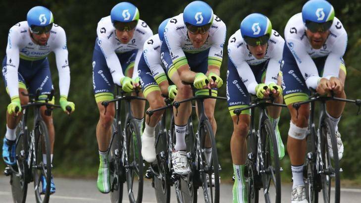 Team Orica GreenEdge rides during the ninth stage of the Tour de France cycling race, a team time-trial over 28 kilometers (17.4 miles) with start in Vannes and finish in Plumelec, France, Sunday, July 12, 2015. (AP Photo/Peter Dejong) Photo: Peter Dejong