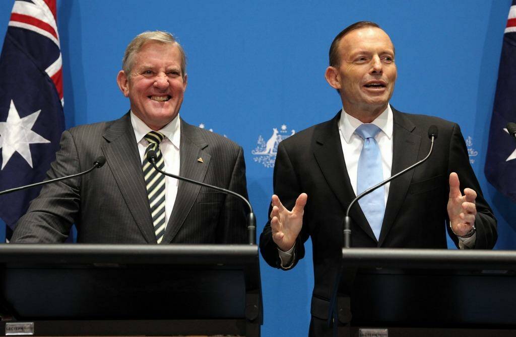 Industry Minister Ian Macfarlane and Prime Minister Tony Abbott announce the policy changes on Tuesday. Photo: Alex Ellinghausen