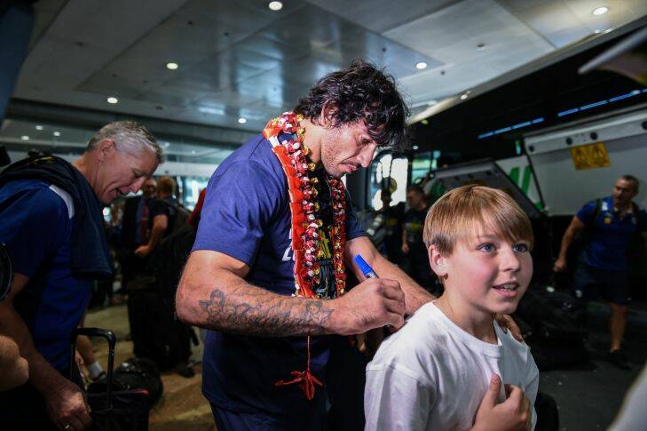 Johnathan Thurston  after the NRL Grandfinal 2015.Winners the Queensland Cowboys fly home to Townsville from sydney's domestic airport today.Fans,family and friends were there to say congradulations.
Photography Brendan Esposito
smh,news/sport,5th October,2015