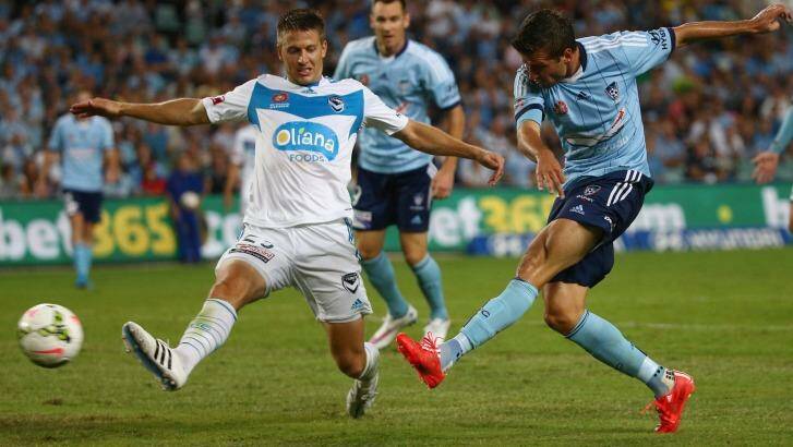 Milos Dimitrijevic shoots at goal against Melbourne Victory.