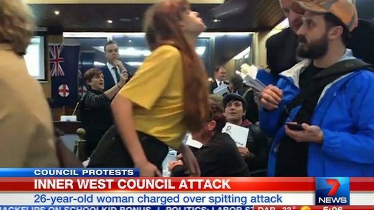 Cartoonist Nicola Minus has been charged with spitting on Richard Pearson, the newly appointed head of the Inner West Council during a protest against council amalgamations. Photo: Channel Seven