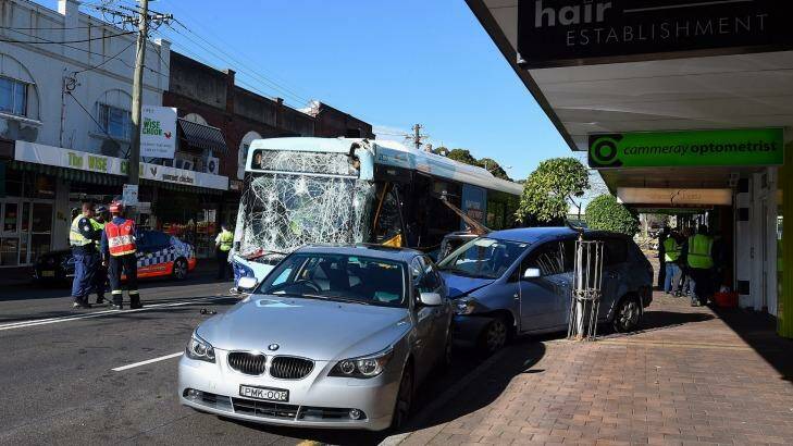 A parked car was pushed onto the footpath in the crash at Cammeray. Photo: Kate Geraghty