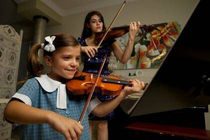 Six-year-old Natalia Zahorsky with her tutor Monica Rouvellas. Photo: Wolter Peeters