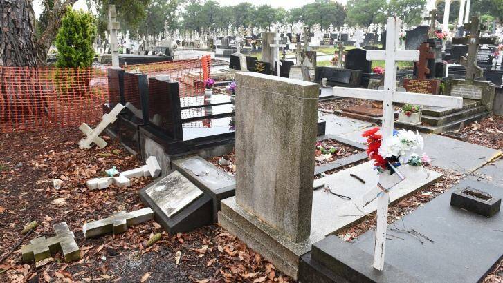 Vandals knocked over gravestones in Rookwood Cemetery Photo: Nick Moir