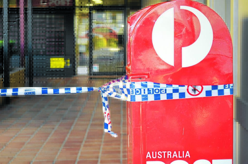 HOLD-UP ARRESTS: Two men arrested on Thursday night have also been charged in connection to an armed hold-up at the post office in Armidale s Girraween area. Photo: Armidale Express