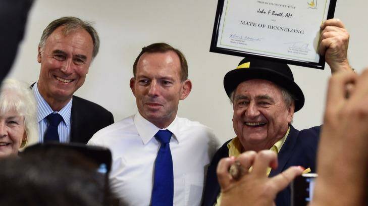 John Booth, right, who has been charged after ICAC findings, with his 'matehood' award with Bennelong  MP John Alexander and Prime Minister Tony Abbott. Photo: Nick Moir