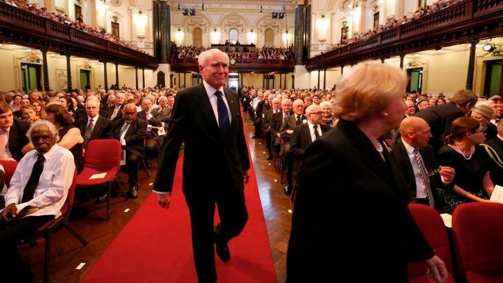 Former prime minister John Howard takes his seat at Gough Whitlam's state memorial service. Photo: Peter Rae