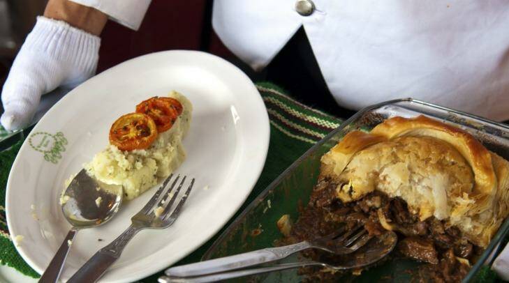 Old comforts: Steak and kidney pie with mashed potatoes and grilled tomatoes at the colonial-era Windamere Hotel in Darjeeling, India. Photo: Leisa Tyler