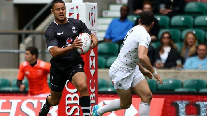 On the run: Jarryd Hayne eyes up the England defence. Photo: Getty Images 
