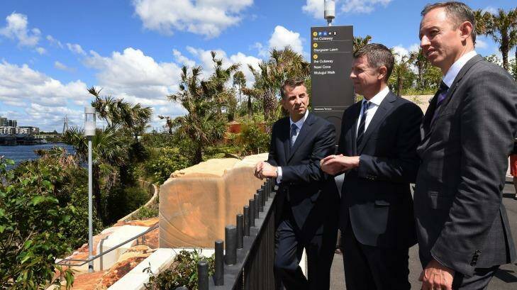 Transport Minister Andrew Constance (left), Premier Mike Baird and Sydney Metro boss Rodd Staples overlook the site for a new train station at Barangaroo. Photo: Kate Geraghty