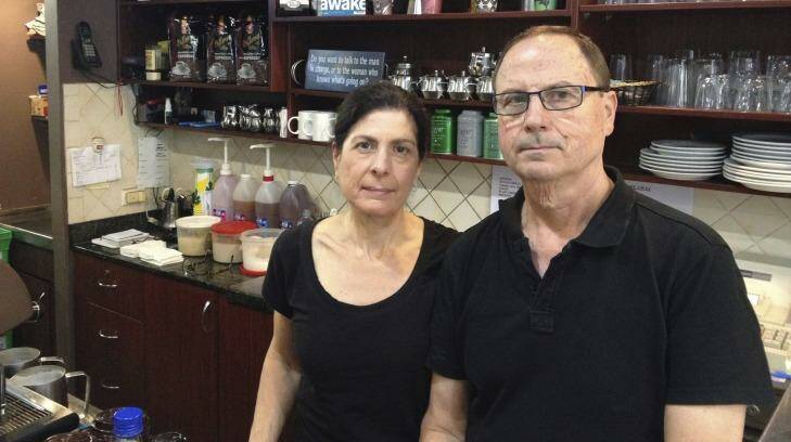 "They're taking away our livelihood'' ...  Deanne and Spiro Coucouvinis at their cafe they have run since 2003. Photo: Samuel Roberts